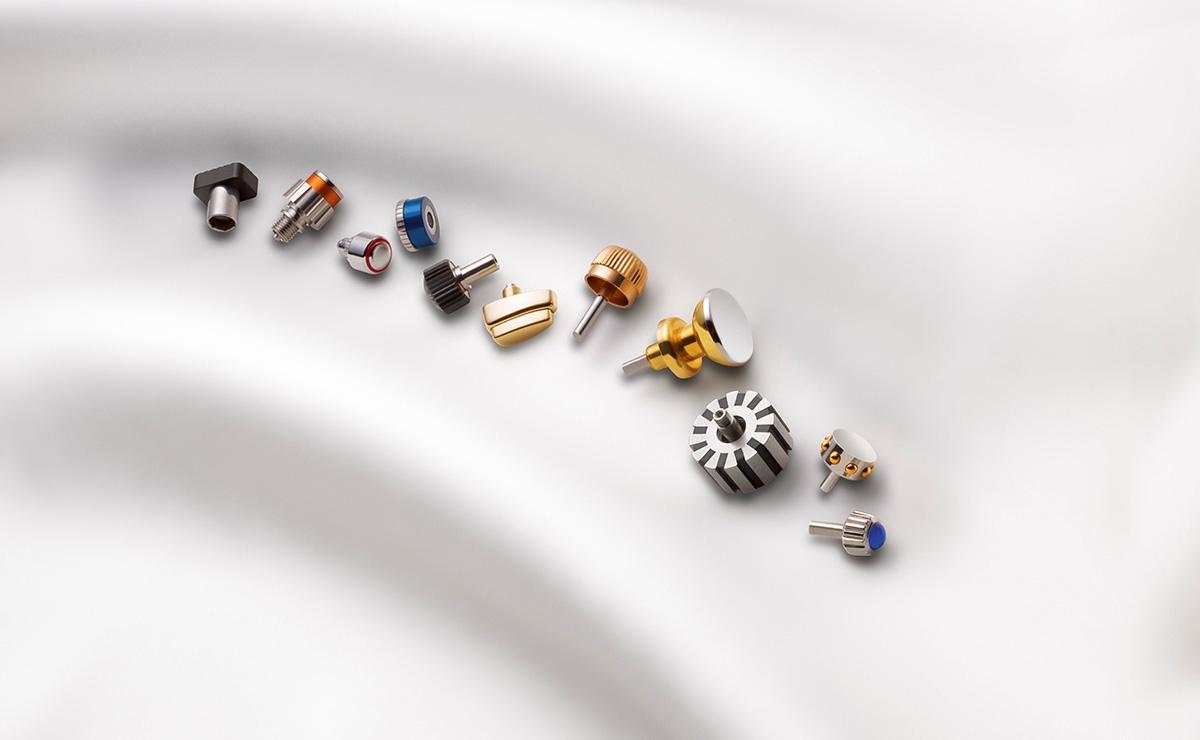 Crowns and pushers for watches